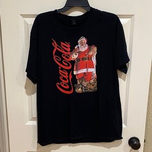 Coca Cola Black T‑Shirt with Red Coca‑Cola Script and Santa Graphic